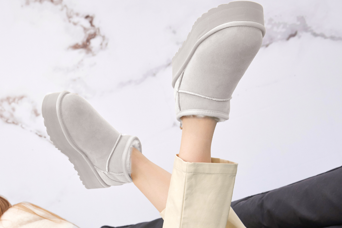 Suede snow boots showcasing their soft texture and fashionable appearance.